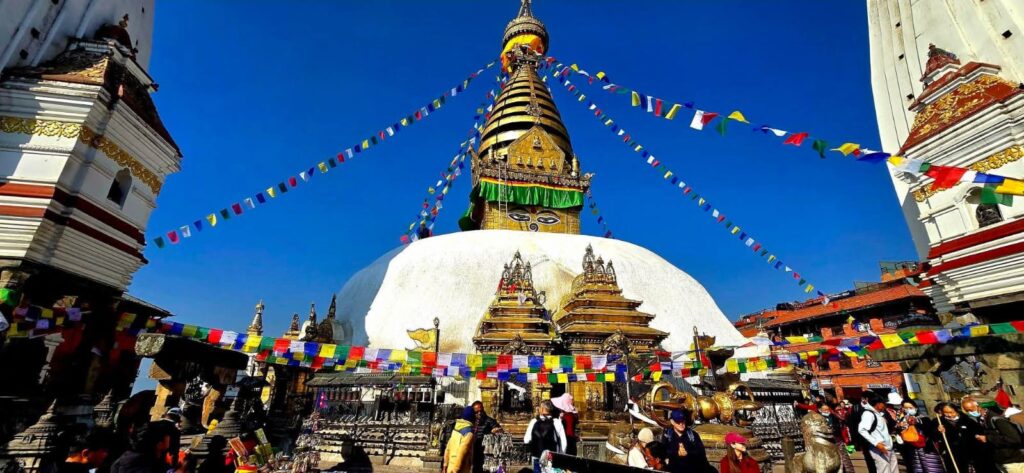Swayambhunath Stupa, also known as the Monkey Temple, is one of Nepal’s oldest and most sacred Buddhist sites. Located on a hilltop west of Kathmandu, it offers panoramic views of the Kathmandu Valley. The stupa is famous for its peaceful atmosphere, ancient architecture, prayer flags, Buddha eyes, and the many monkeys living around the shrine. It is an important pilgrimage site for both Buddhists and visitors exploring Nepal’s culture and heritage.