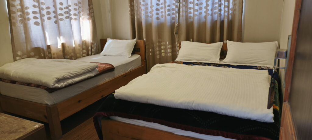 Annapurna Base Camp Trek teahouse room with twin beds