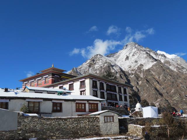 Tengboche Monastery overlooking the snowy Himalayan landscape.